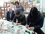 Президент Пензин проводит мастер класс по русскому лубку среди корейских художников